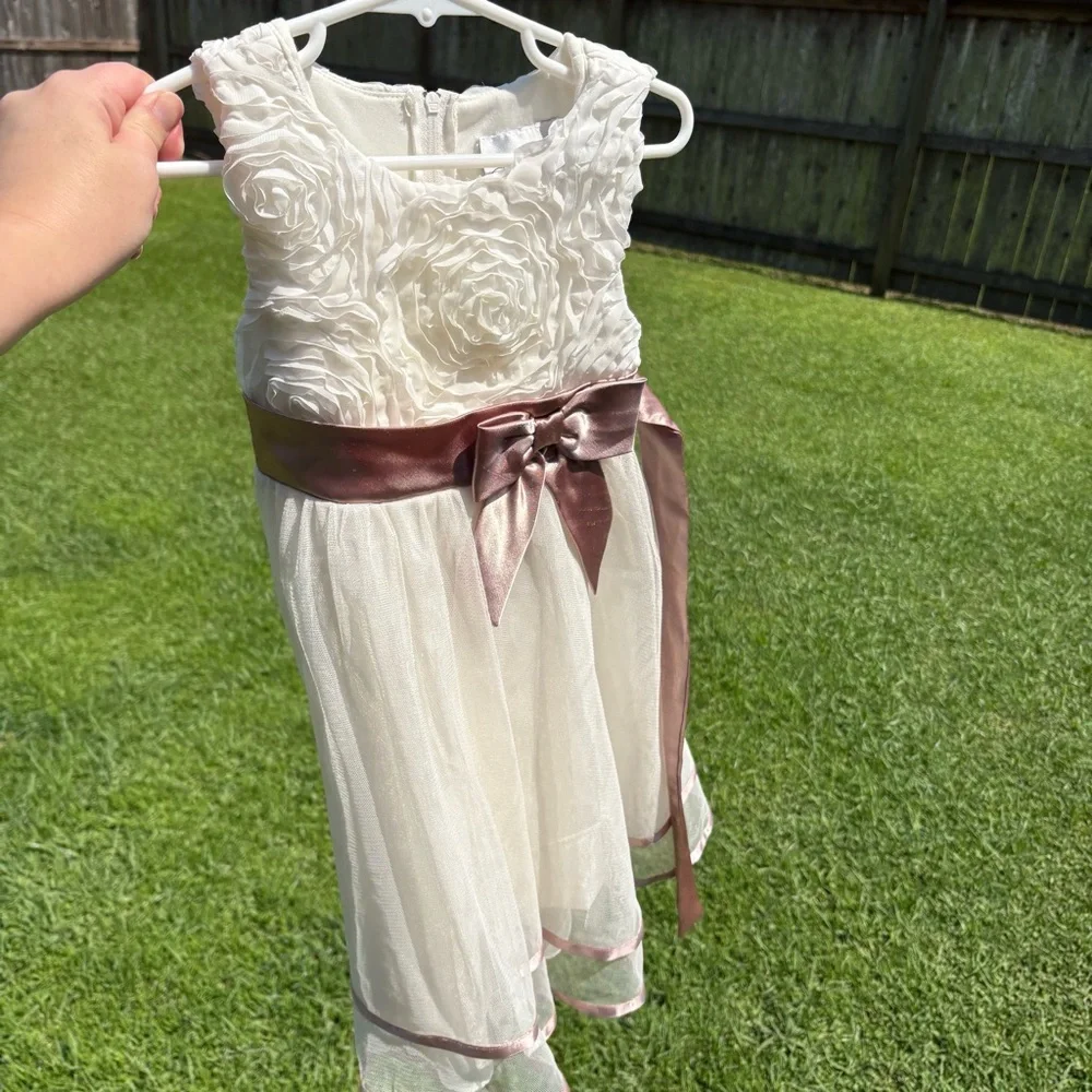 Rare Editions off white with taupe colored sash Size 4 Good used condition